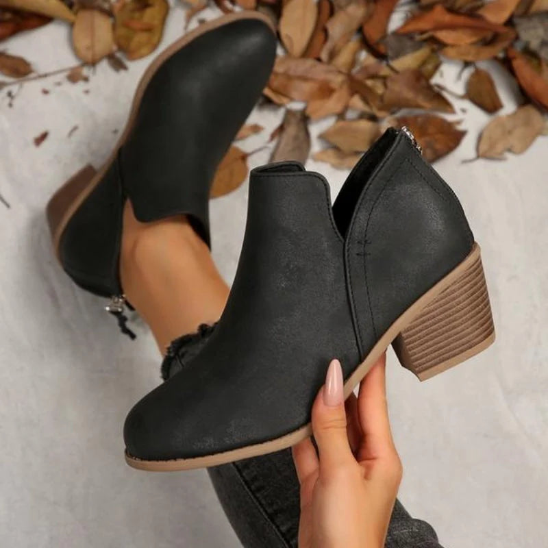 Women's Black Ankle Boots | Textured Faux Leather, Fringe Zip Detail 1